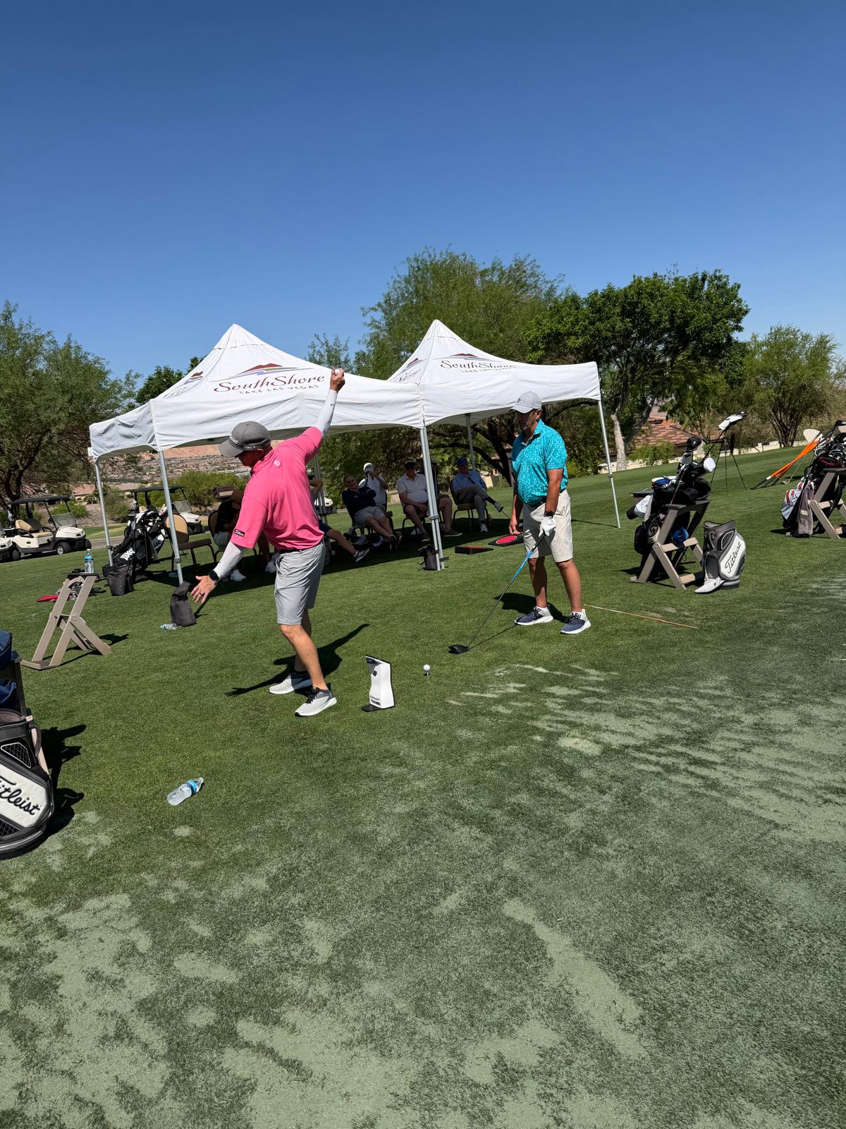Golf school instruction on the practice range